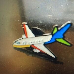 Airplane enamel lapel pin